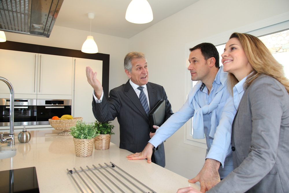 A classic high street estate agent conducting a viewing